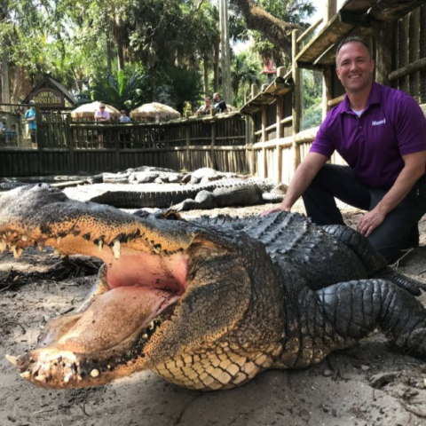 Mazuri® researcher Dr. Troy Tollefson and a crocodile at the St. Augustine Alligator Farm